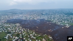 Lava from the eruption of Mount Nyiragongo cuts through Buhene north of Goma, Congo, May 24, 2021. 