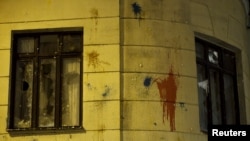 Windows of Turkish embassy smashed in reaction to downing of Russian war plane, Moscow, Nov. 25, 2015.