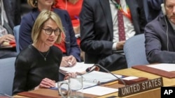 FILE - U.S. United Nations Ambassador Kelly Craft address the U.N. Security Council after a failed vote on a humanitarian draft resolution for Syria, Sept. 19, 2019 at U.N. headquarters. 