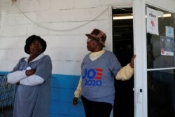 People wait for Democratic U.S. presidential candidate and former U.S. Vice President Joe Biden to arrive at Scott's Bar-B-Que in Hemingway, S.C., Feb. 27, 2020.