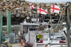 Mi'kmaq fishermen prepare their fishing gear to participate in the Indigenous lobster fishery in Saulnierville, Nova Scotia, Canada, Oct. 20, 2020.