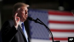 President Donald Trump speaks at Fort Myer in Arlington Va., Aug. 21, 2017, during a presidential address on U.S.-Afghanistan strategy, Aug. 21, 2017. 