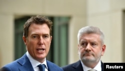 Attorney-General Christian Porter and Minister for Communications Mitch Fifield during a press conference at Parliament House in Canberra, Australia, Apr. 4, 2019. 