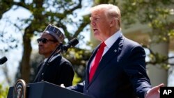 Villagers pluck water chestnuts from a pond in Kanpur, Uttar Pradesh state, India. Workers earn about about 250 Rupees ($3.50 USD) a day after spending 5-6 hours extracting the aquatic vegetable that grows mostly in stagnant water.