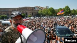 FILE - Armenian opposition leader Nikol Pashinyan addresses supporters during a rally in Yerevan, Armenia, April 25, 2018. 