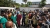 The body of a elderly woman is shown to the press at Kinshasa central morgue, on April 13, 2015, where the local governement organized a visit to highlight the need for mass graves after more than 420 bodies were discovered 100 km outside Kinshasa. 