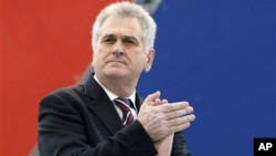 Serbia's Progressive Party leader Tomislav Nikolic attends a protest rally in Belgrade, Serbia, April 16, 2011