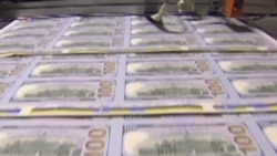 US Central Bank Reduces Monthly Bond Purchases to $65 Billion