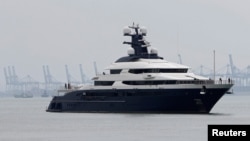 Seized luxury yacht Equanimity, belonging to fugitive Malaysian financier Low Taek Jho, is brought to Boustead Cruise Terminal in Port Klang, Malaysia, Aug. 7, 2018. 