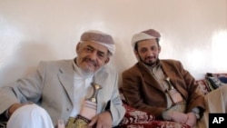 Tribal leader Sheikh Ghaleb al-Ashdaa of the Murad, and his son Khaled
al-Ashdaa, in Sana'a. Both men favor government negotiations with
Yemeni militants. January 10, 2010.