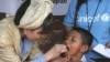 FILE - Renowned Japanese actress Tetsuko Kuroyanagi who is a UNICEF Goodwill Ambassador gives an Indonesian boy a measles vaccination Thursday Feb. 3, 2005 in the remote village of Keudai Tenom on Aceh's West coast.
