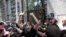 Protesters storm the office of LGBT+ campaigners at a rally against the planned March for Dignity during Pride Week in Tbilisi, Georgia, July 5, 2021. 