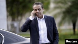 FILE - Brazilian Minister of Tourism Henrique Alves, pictured in December 2015 in Brasilia, is the third minister to resign in a month in connection with the Petrobras graft probe.