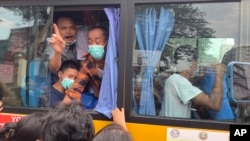 Released prisoners on a bus leave from Insein Prison in Yangon, Myanmar, May 3, 2023.