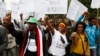 FILE - People protesting against an earlier security force attack on a student rally in Orono shout slogans during a demonstration organized by the opposition Ethiopian Federal Democratic Unity Forum in Addis Ababa, May 24, 2014. 