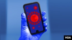 FILE - Governments are rushing to put together smartphone apps that can be part of their arsenal to curtail the spread of COVID-19. 