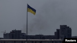 Smoke rises after Russian missile strikes in Kharkiv, Ukraine, on May 23, 2024.