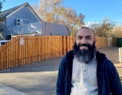 Daniel Echebarria, a 39-year-old supporter of President Donald Trump, poses for a picture in Carson City, Nev., where he works as a teacher.