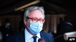 FILE - Joel Meyer, French ambassador to Mali, speaks to the press in Bamako, Jan. 21, 2022.