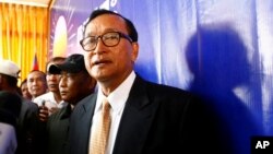 Cambodia National Rescue Party (CNRP) President Sam Rainsy looks on after a press conference in his main party headquarters.