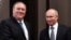 Russian President Vladimir Putin, right, and U.S. Secretary of State Mike Pompeo, pose for a photo before their talks in the Black Sea resort city of Sochi, southern Russia, May 14, 2019. 