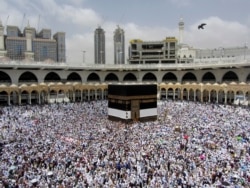Muslim pilgrims circumambulate around the Kaaba in the Muslim holy city of Mecca, Saudi Arabia, Aug. 9, 2019.