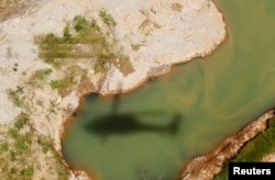 A view from a helicopter shows ecological damage caused by illegal gold mining in a rural area of Santander de Quilichao, in the department of Cauca, Feb. 13, 2015.