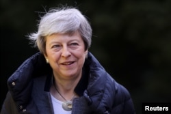 Britain's Prime Minister Theresa May leaves church, as Brexit turmoil continues, in Sonning, Britain, May 12, 2019.