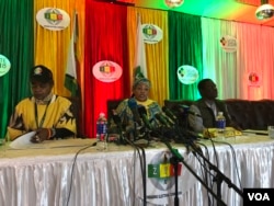 Zimbabwe Electoral Commission head Priscilla Chigumba speaks to reporters and observers in Harare flanked by deputy Joyce Kazembe and her chief officer Utoile Silaigwana, July 30, 2018.