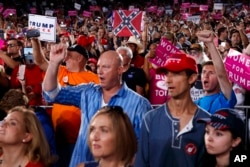 Supporters of Republican presidential candidate Donald Trump cheer during a campaign rally, Oct. 24, 2016, in Tampa, Fla.