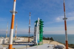 The Nuri rocket, the first domestically produced space rocket, sits on its launch pad at the Naro Space Center in Goheung, South Korea, Thursday, Oct. 21, 2021. (Korea Pool via AP)