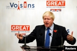 FILE - Britain's Foreign Secretary Boris Johnson gives a speech at the British Embassy during his European tour on Brexit, in Paris, France, Oct. 27, 2017.
