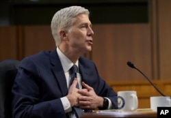 FILE - Then-Supreme Court nominee Neil Gorsuch testifies on Capitol Hill in Washington, March 22, 2017, during his confirmation hearing before the Senate Judiciary Committee.