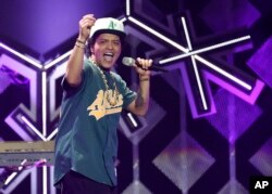 Bruno Mars performs at the 2016 Jingle Ball at Staples Center, Dec. 2, 2016, in Los Angeles.