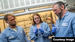 Members of the scientific research team at the Department of Energy’s Lawrence Berkeley National Laboratory included (left to right) Peter Christensen, Kathryn Loeffler and Brett Helms. (Credit: Marilyn Chung/Berkeley Lab)