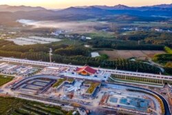 FILE - The Ganlanba railway station, one of the stations along the China-Laos railway, is under construction in southwestern China's Yunnan Province, Sept. 28, 2021, in this photo released by Xinhua News Agency.