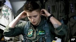 Lt. Jennifer Sandifer, a fighter pilot from Texas, prepares to launch from the U.S.S. Dwight D. Eisenhower aircraft carrier toward targets in Iraq and Syria, Nov. 22, 2016.