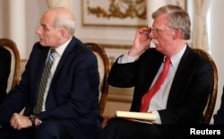 White House Chief of Staff John Kelly and national security adviser John Bolton attend U.S. President Donald Trump's meeting with Japan’s Prime Minister Shinzo Abe at Trump’s Mar-a-Lago estate in Palm Beach, Fla., April 17, 2018.