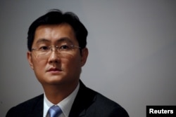FILE - Tencent Chairman and Chief Executive Officer Ma Huateng attends a news conference announcing the company's results in Hong Kong, March 17, 2016.