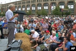 Texas Congressman and presidential candidate Ron Paul speaks to a crowd at the Iowa State Fair, in the state capital Des Moines, August 12, 2011