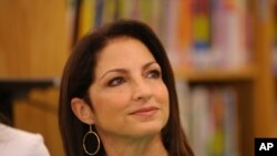 Singer Gloria Estefan pays a visit to her first grade teacher during the Festival People en Espanol 2013, on Aug. 30, 2013 at Winston Elementary School in San Antonio, Texas.