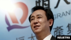 FILE - Hui Ka Yan, chairman of Evergrande Real Estate Group Ltd,, attends a news conference in Hong Kong, China on March 29, 2016.