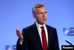 NATO Secretary-General Jens Stoltenberg holds a news conference after a meeting with the ambassadors at the Alliance headquarters in Brussels, Belgium, Nov. 26, 2018.