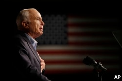 FILE - Sen. John McCain, R-Ariz., then a Republican presidential candidate, speaks at a rally in Davenport, Iowa, Oct. 11, 2008.