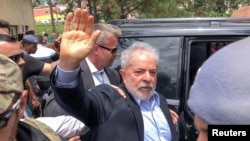 Former Brazilian President Luiz Inacio Lula da Silva leaves for the cemetery to attend the funeral of his 7-year-old grandson, in Sao Bernardo do Campo, Brazil, March 2, 2019.