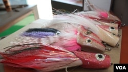 Some of Elpheus Ndlovu's sailfish flies. (Darren Taylor for VOA News)