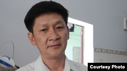 Nhà báo Trương Minh Ðức.