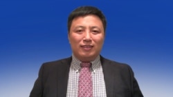 现为美利坚大学访问学者的前中国人权律师陈建刚