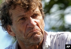 Larry Dimas talks about the struggles of his life in the aftermath of Hurricane Irma, in Immokalee, Florida, Sept. 12, 2017.