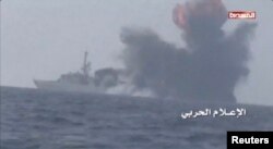 FILE - An explosion is seen onboard what is believed to be a Saudi warship, off the western coast of Yemen in this still frame taken from video posted by Houthi-run al-Masirah television on their social media website, and obtained by Reuters, Jan. 31, 2017.